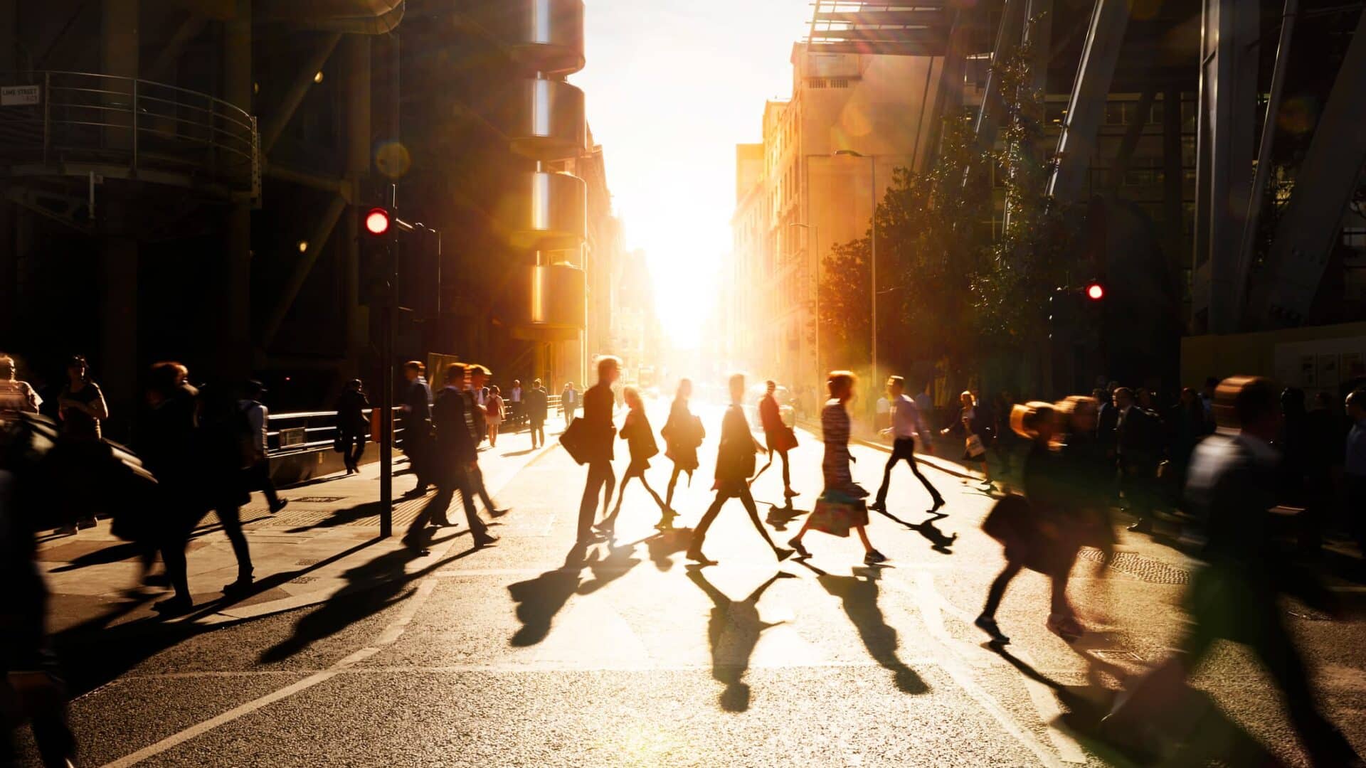 People crossing a busy street